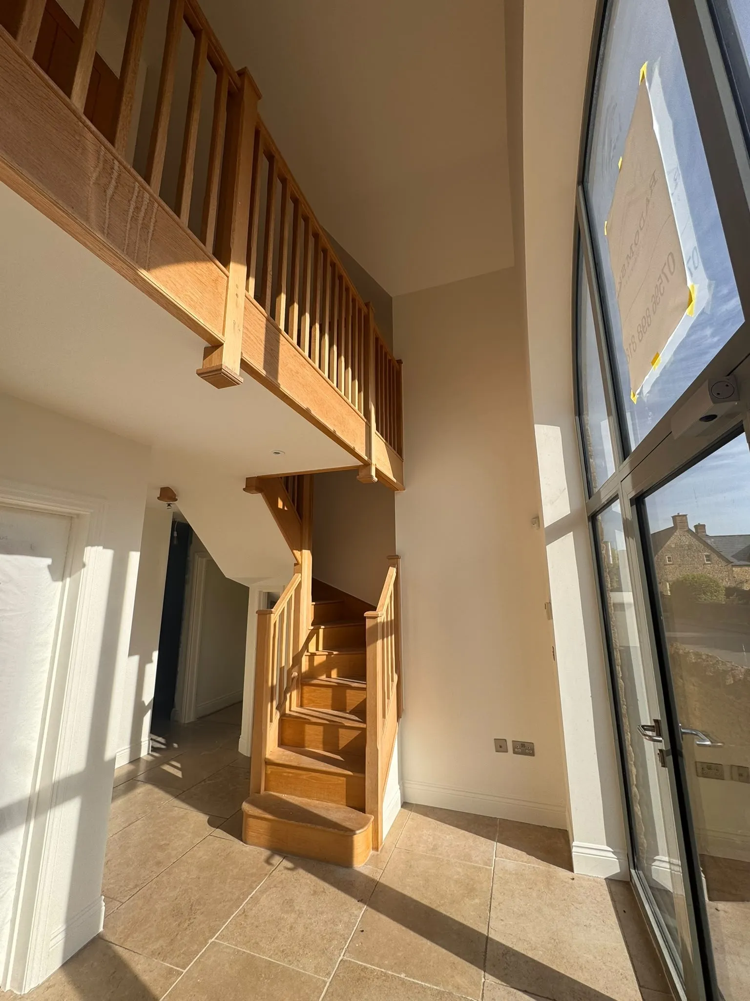 High double-height stairwell decorated top to bottom